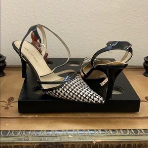 And Klein black and white pointy heels